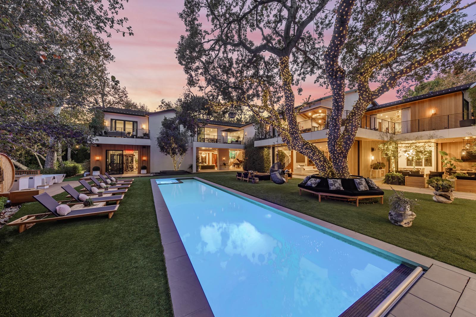 Rectangular swimming pool outside Zedds Encino home