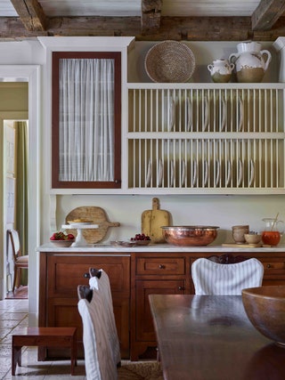 Furnish your kitchen with antiques and vintage for that collected vibe thats integral to French country design. Thats...