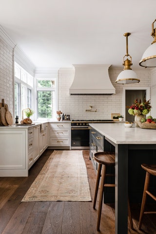 Though weathered stone is often the floor material of choice for French country kitchens Emily Ruff of Cohesively...