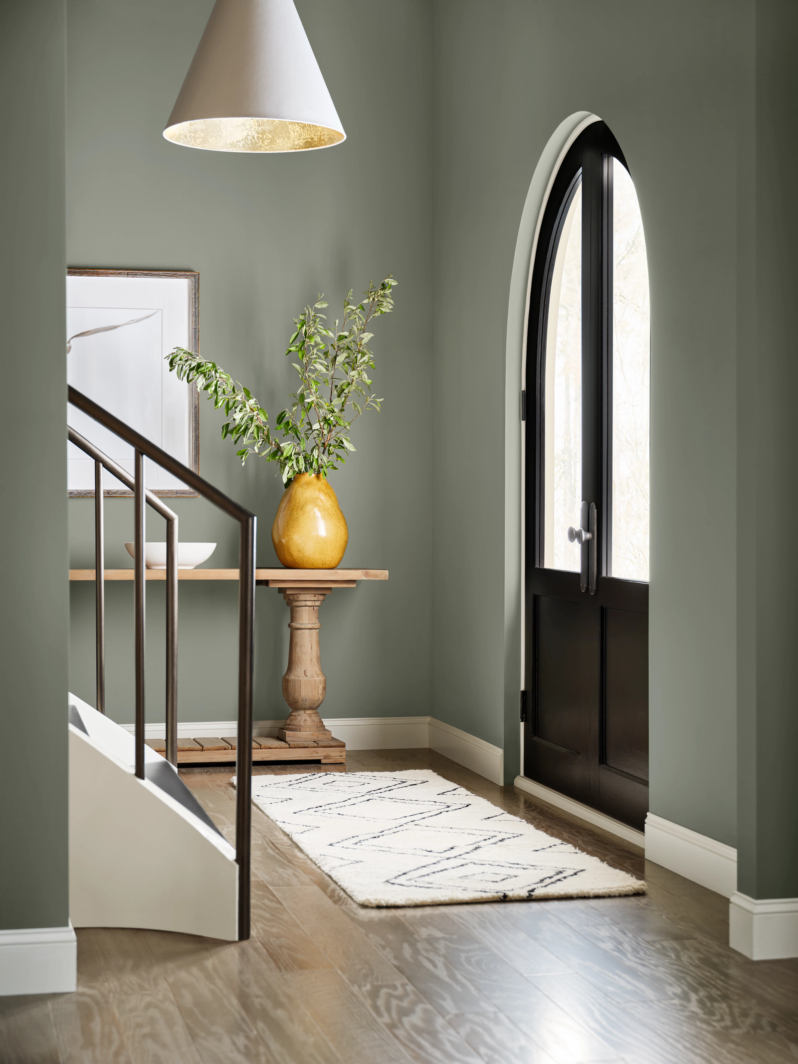 Entryway with greenish gray walls